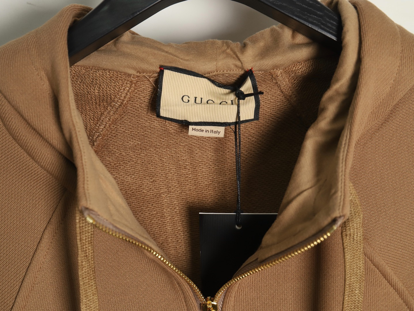 G*u*i hoodies
